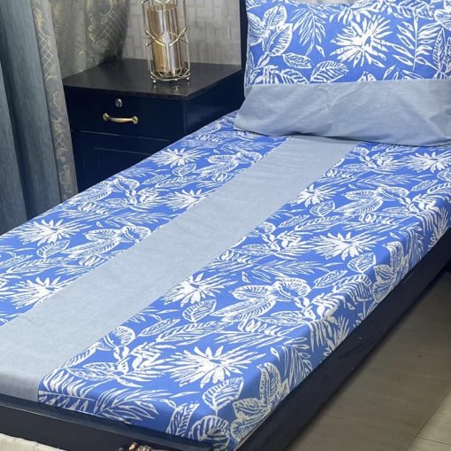 Handcrafted patchwork embroidery on a soft cotton bed sheet