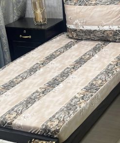 Intricate embroidered patchwork design on premium cotton bed sheet