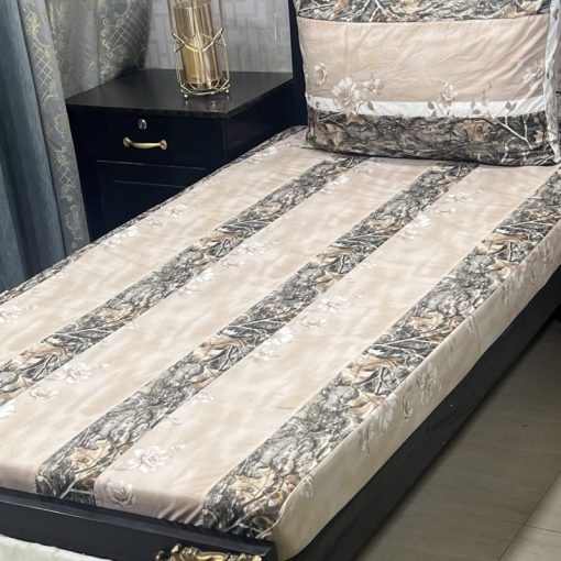 Intricate embroidered patchwork design on premium cotton bed sheet