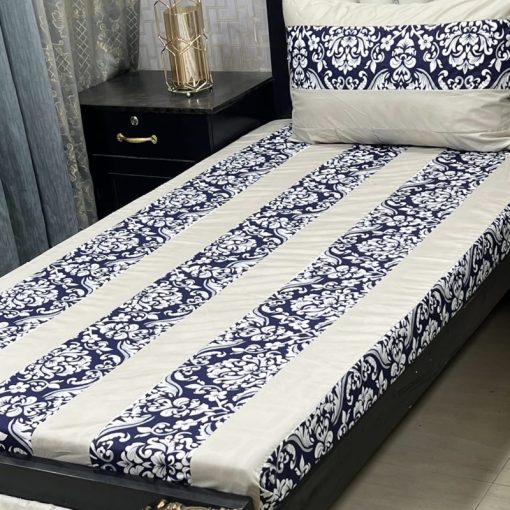 Embroidered cotton bed sheet with decorative patchwork design