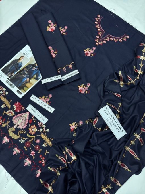Qalamkar QM-570 | Winter 3 Piece Dhanak Embroidered Suit with Pashmina Wool Shawl is a masterpiece from Qalamkar’s latest winter collection, designed to offer unmatched elegance and warmth during the chilly season. This outfit is crafted with premium Dhanak fabric, known for its softness, durability, and insulating quality, making it the perfect choice for winter fashion.