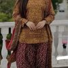 Pakistani ladies winter luxe collection suit with digital print and plain trouser  