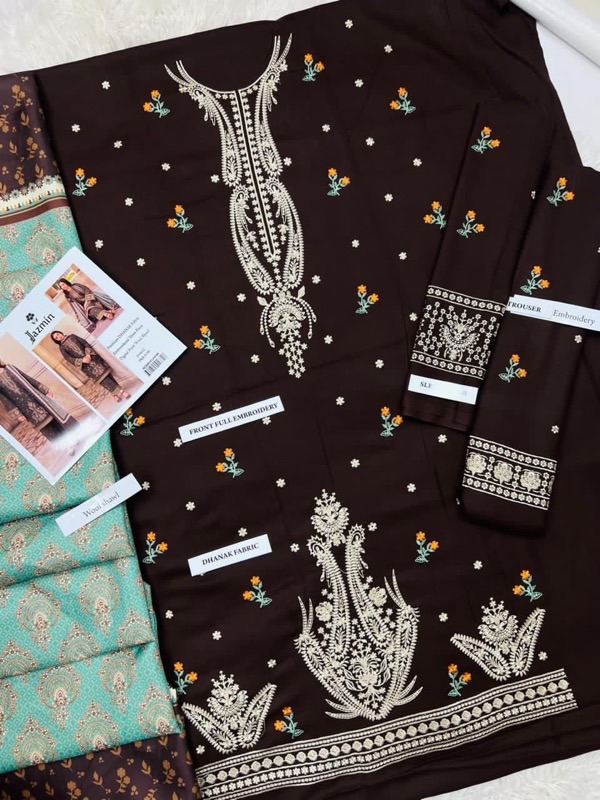 This 3-piece ensemble features full heavy embroidery on the Dhanak shirt front and sleeves, a beautifully dyed back, and a digitally printed wool shawl, making it both luxurious and practical for the colder months.