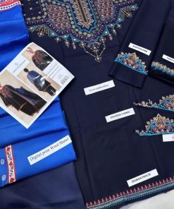 This suit’s blend of premium Dhanak fabric, detailed embroidery, and a stylish wool shawl makes it highly versatile and a wise addition to your seasonal wardrobe. It offers a canvas for personalization through tailoring, ensuring you get a piece that fits your body and style exactly.