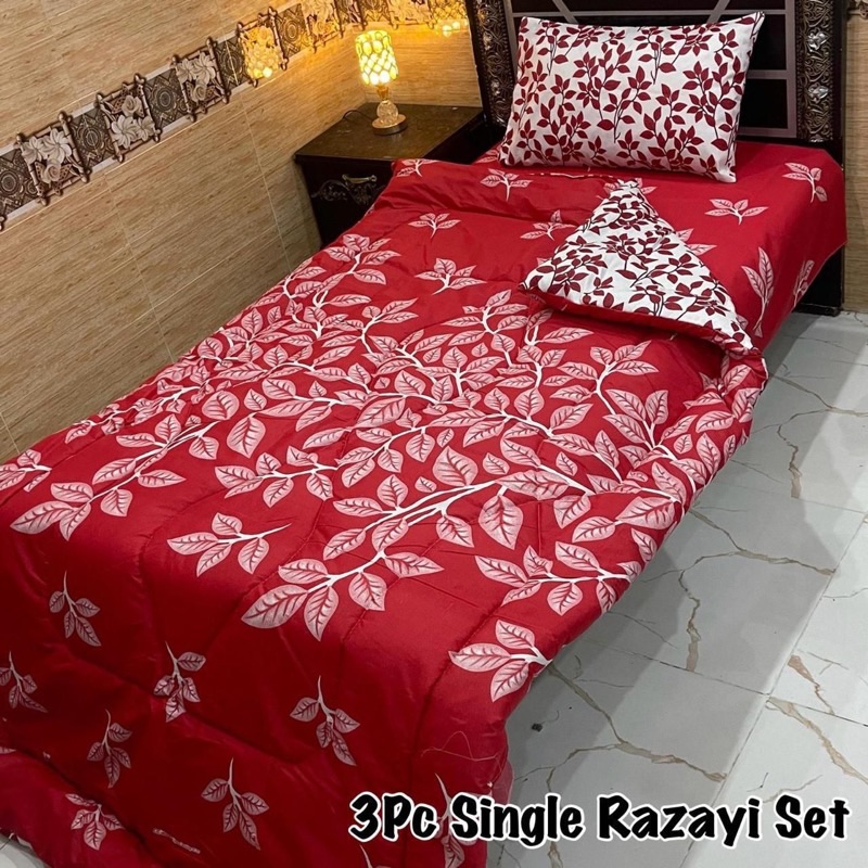Colorful Single Bed Razai Set with 3 pieces including warm quilt, soft cotton bedsheet, and printed pillow cover for cozy sleep.
