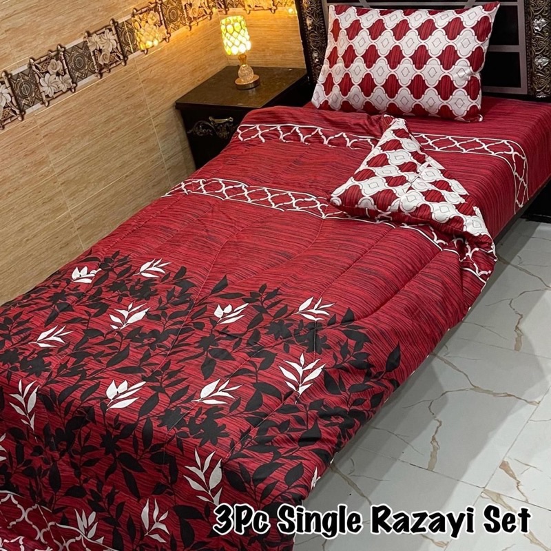 Cozy and affordable Single Size 3 Pcs Vicky Razai Set with soft cotton quilt, matching bedsheet, and printed pillow cover for hostels or guest rooms.