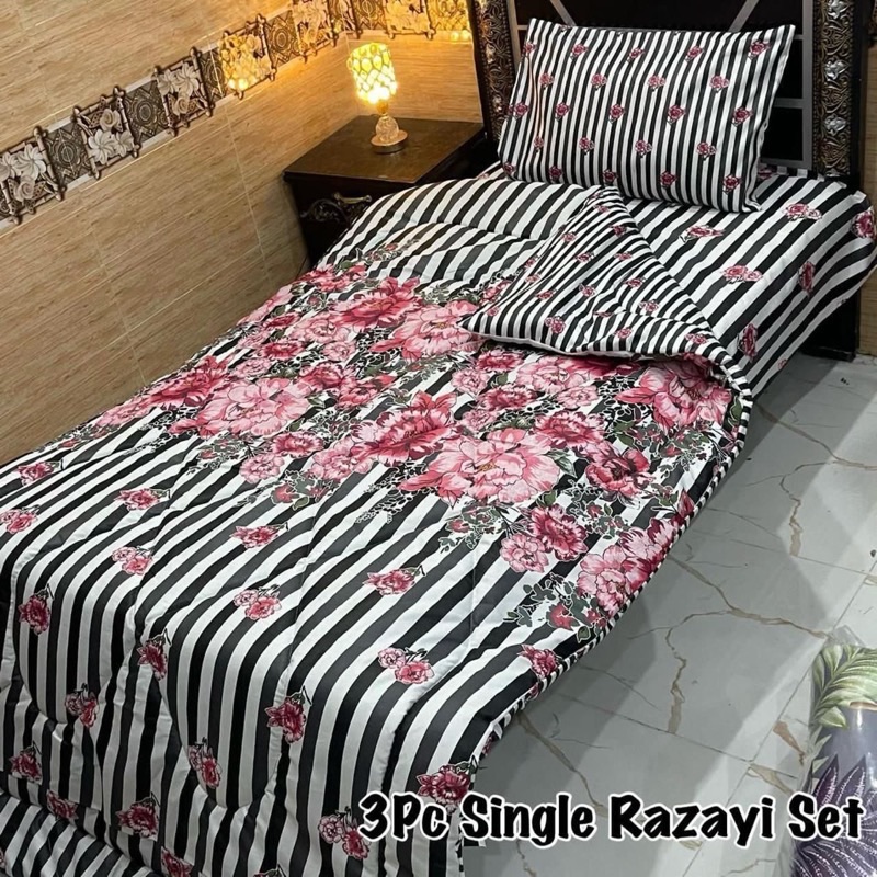 Premium Single Size Vicky Razai Set with 3 pieces including warm cotton quilt, printed bedsheet, and pillow cover for stylish bedroom décor.