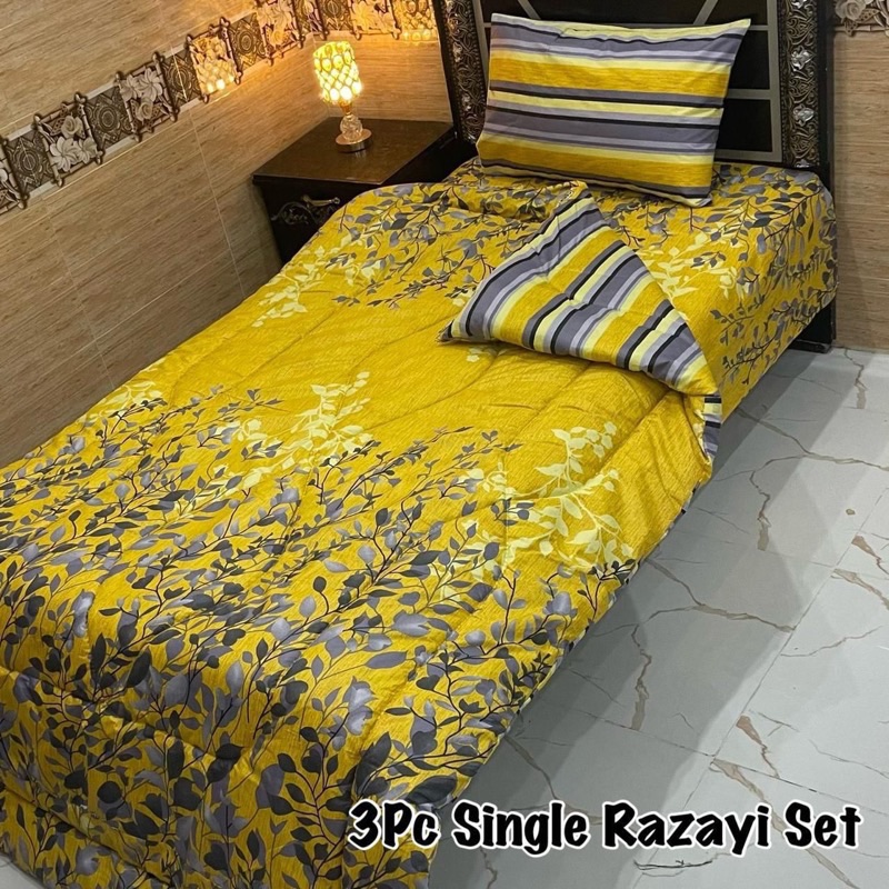 Bright and cozy Single Bed 3 Pcs Razai Set with printed quilt, mix cotton bedsheet, and matching pillow cover for stylish décor.