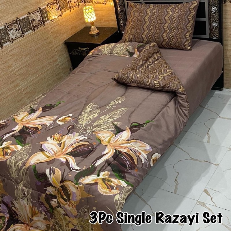 Affordable and colorful Single Bed 3 Pcs Vicky Razai Set with warm quilt, soft mix cotton bedsheet, and matching pillow cover.
