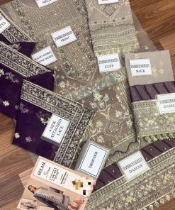 The Gulaal 3 Piece Unstitched Embroidered Suit GL-623 is a refined blend of luxury, craftsmanship, and feminine elegance. With its premium organza fabric, intricate handwork, embroidered patches, and elegant dupatta, this suit is designed for women who seek exclusivity and timeless beauty.