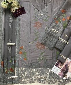 This design features a fully heavy embroidered lawn shirt with scifflie panels, multi-thread centre panel embroidery, cutwork daman border, and a heavily embroidered neckline enhanced with beads work. The look is completed with a fully embroidered net dupatta with heavy borders and pallou detailing, paired with a dyed cambric trouser with embroidered