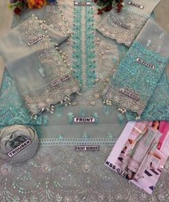 The Elaf Premium EP-703 Organza Suit is a masterpiece designed for women who love luxury, elegance, and detailed craftsmanship. Made with premium organza fabric and paired with a soft malai trouser, this 3-piece suit features stone handwork, adda work, and fine embroidery, making it perfect for weddings and festive occasions.