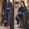 Model wearing a tailored Winter Multani Khaadi Suit showcasing the classic check design and elegant drape.