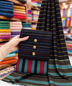 A detailed shot of the unstitched trouser and dupatta fabric of PR-140, emphasizing the authentic Khaddi Susi check patterns and natural textured threads under gentle indoor sunlight.