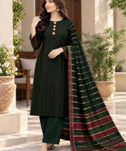 An aesthetic unstitched 3-piece layout of winter suit PR-145 by Abu Hurairah Fabrics, draped with care on a vintage bench, featuring a check style in olive green and vintage red with coarse handloom edges.